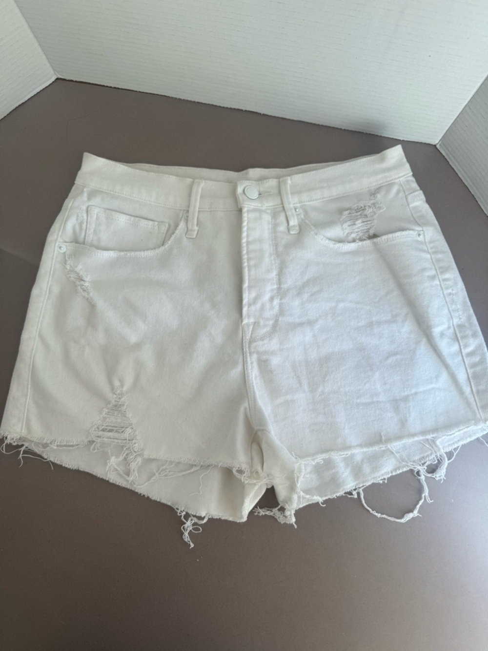 Good American White Distressed Denim Cutoff Shorts